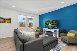 Smart TV, fireplace, books