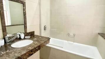 Hair dryer, towels, soap, toilet paper