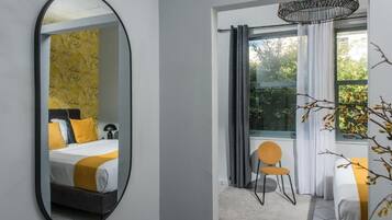 Suite, vista a la ciudad | Caja de seguridad en la habitación y insonorización