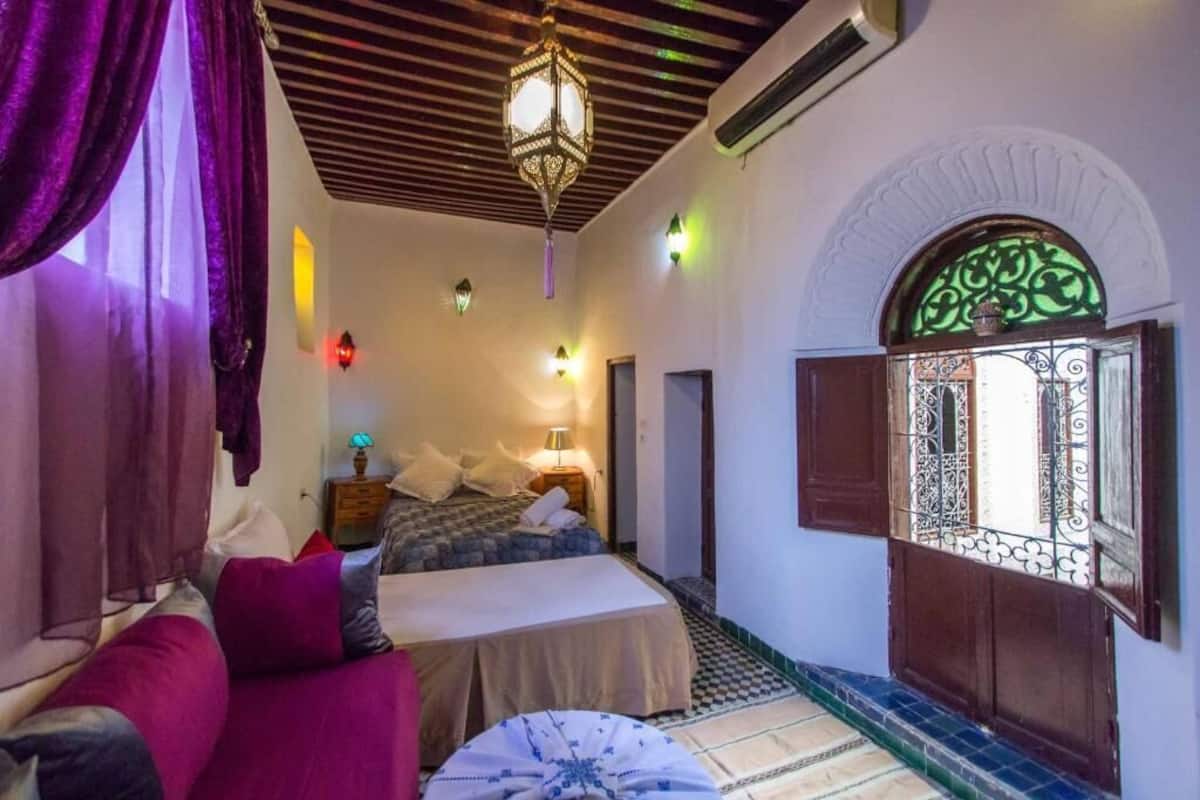 Deluxe Triple Room, Courtyard View | In-room safe, laptop workspace, iron/ironing board, free WiFi