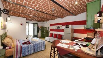 Studio, Patio, Courtyard View | In-room safe, iron/ironing board, free WiFi