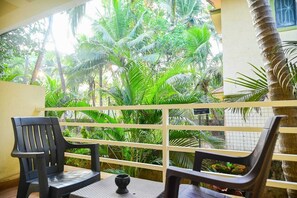 Deluxe Double Room, Garden View | Property grounds - Navratna Guest House (Morjim)