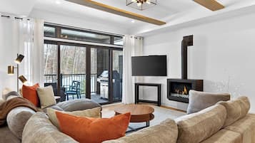 Condo Deluxe, vista a la montaña | Área de sala de estar