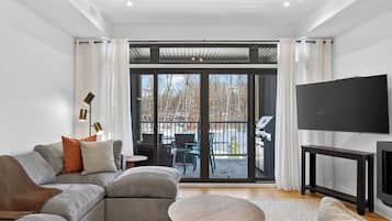 Condo Deluxe, vista a la montaña | Área de sala de estar