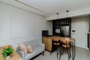 Living area - Loft Moderno Centro Itajaí (Itajaí)