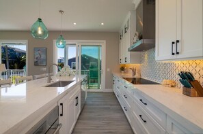 Fridge, microwave, oven, stovetop - Somewhere In The Sun- 7 bedrooms, rooftop, arcade room, pool and spa!!! (Bradenton Beach)