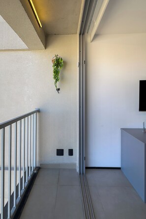 Apartamento conforto, sacada, vista para o parque | Parte interna