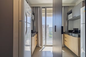 City Apartment, 1 Double Bed, Balcony, City View | Living area - Urban Garden em Moema Varanda e Academia (São Paulo)