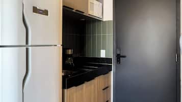 Apartamento conforto, sacada, vista para o parque | Cozinha privada