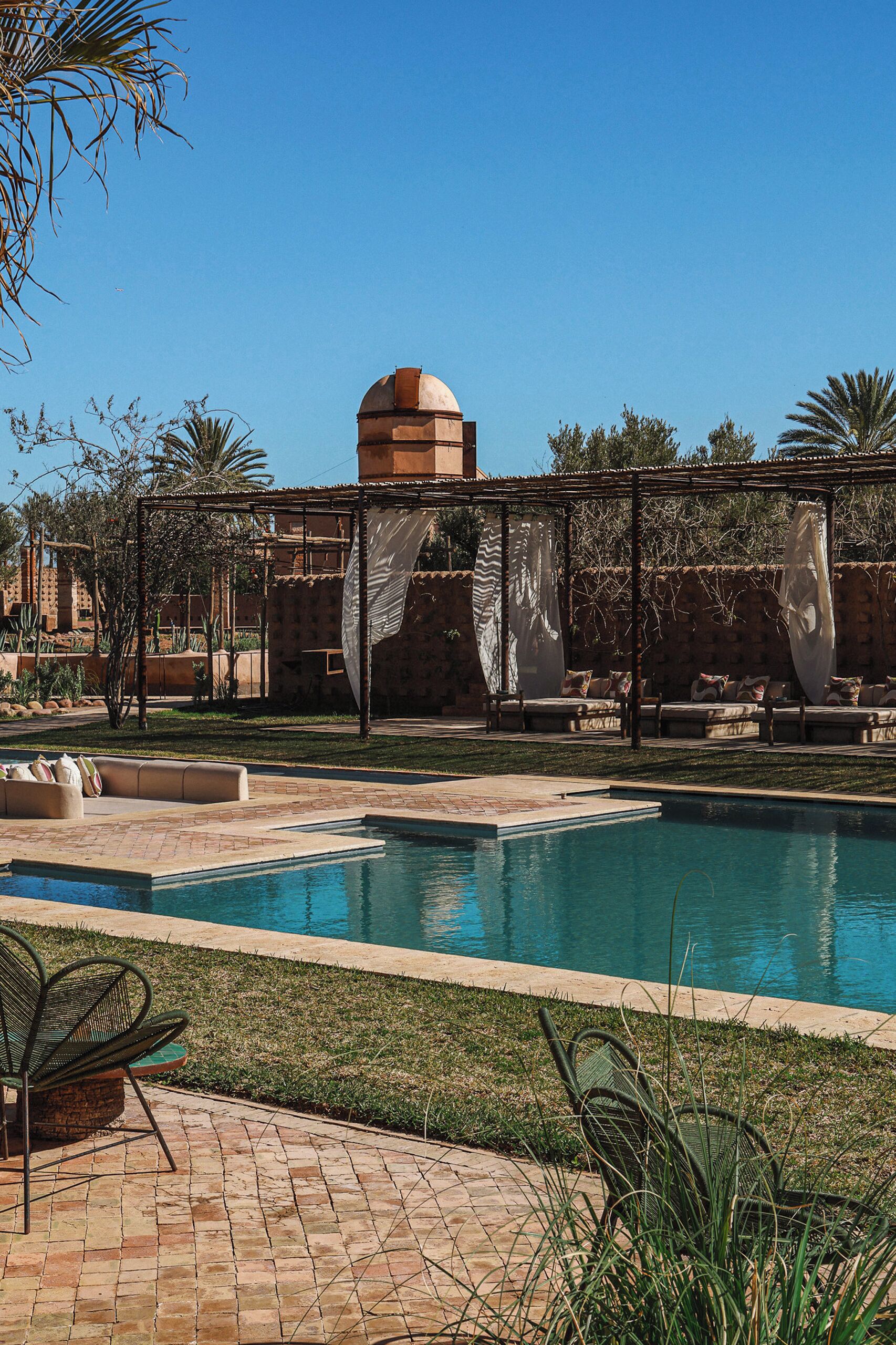 2 outdoor pools, open 10:00 AM to 7:00 PM, pool loungers