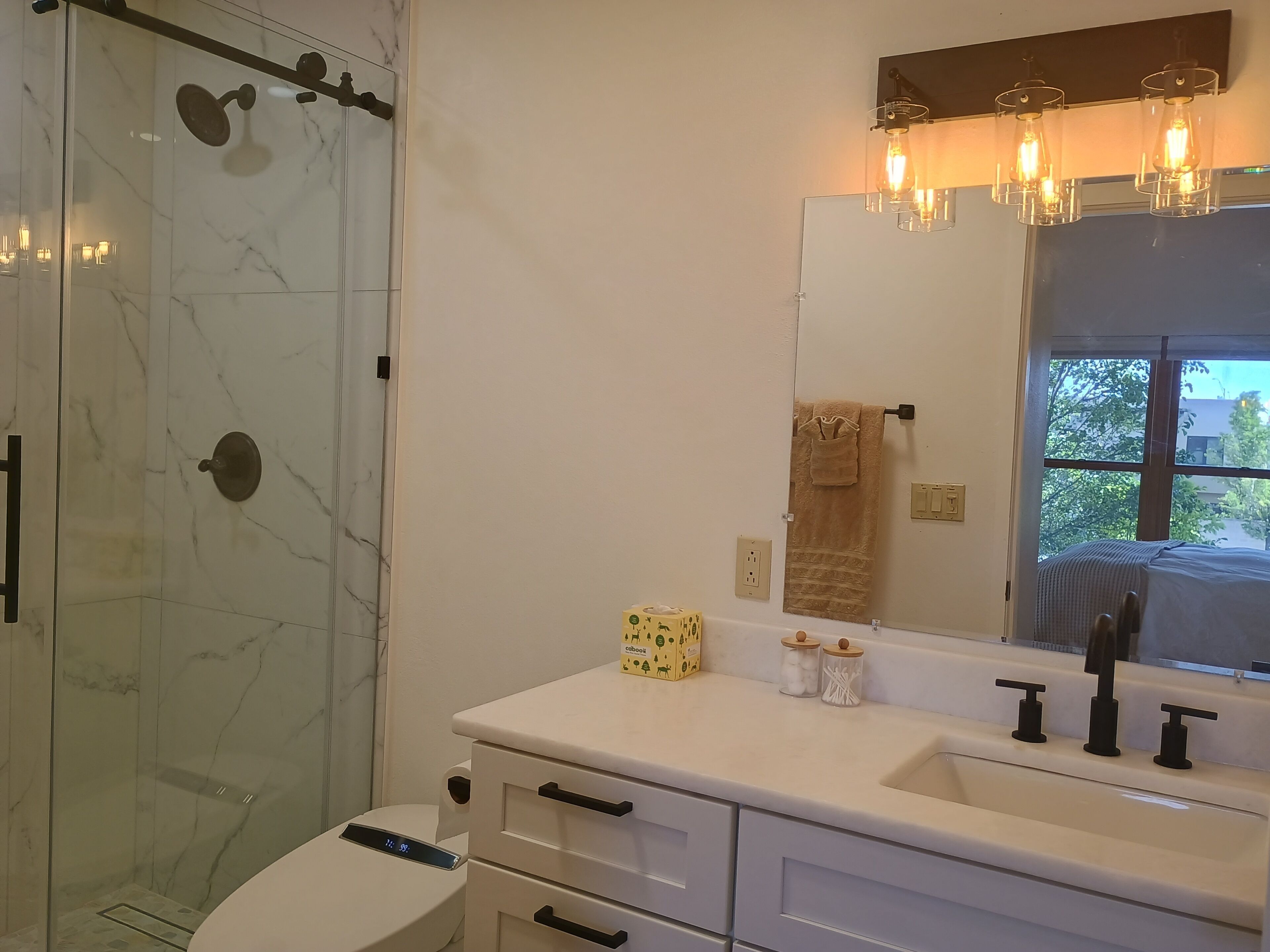 Shower, towels, soap, toilet paper