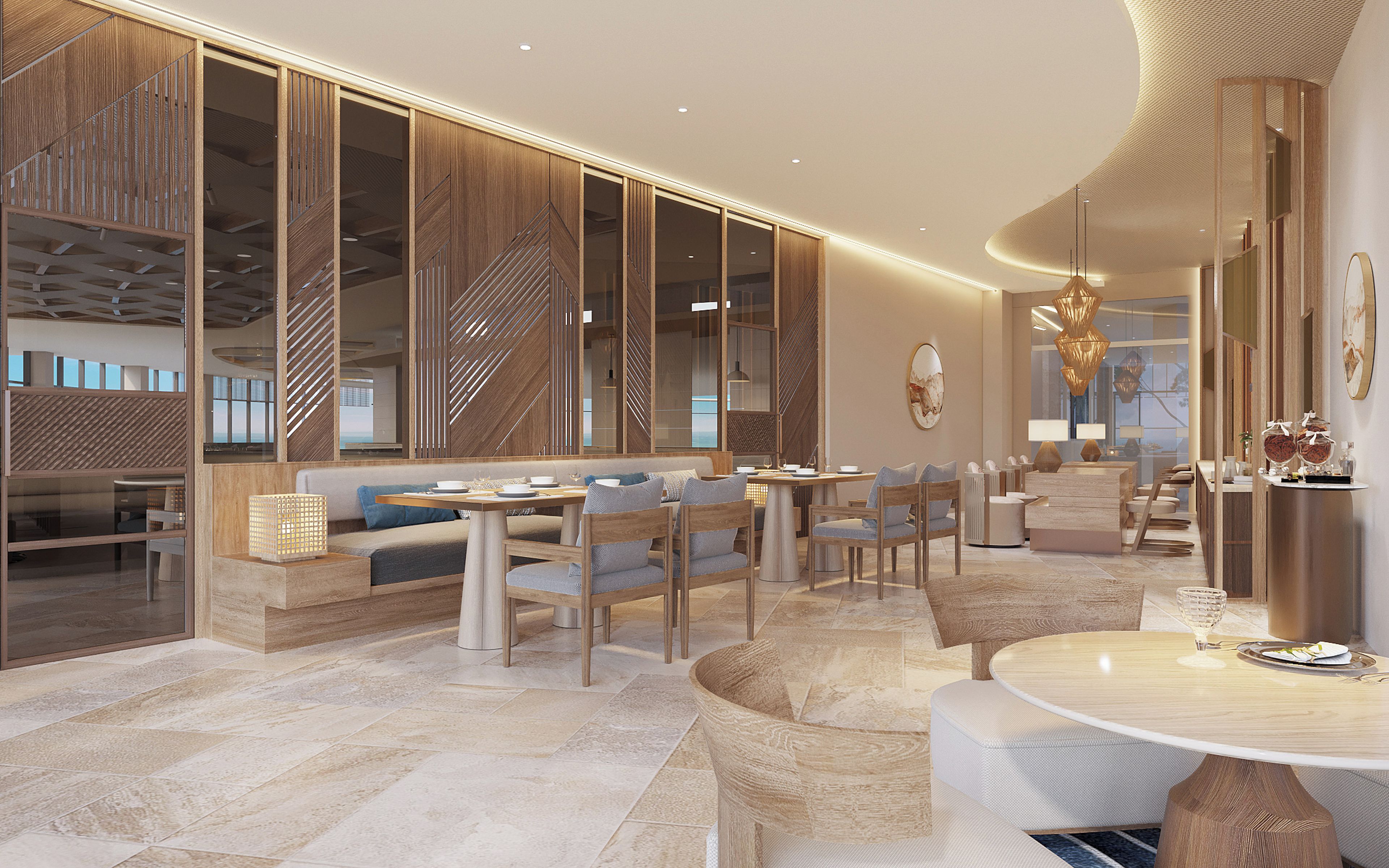 Un moderno vestíbulo de hotel con una zona de estar, un mostrador de recepción y una escalera.