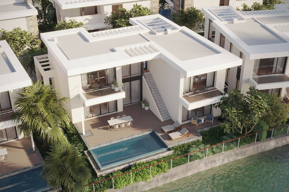 Ein modernes Mehrfamilienhaus mit Dachpool, Sitzgelegenheiten im Freien und üppiger Bepflanzung.
