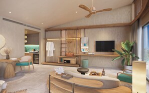 A modern living room with a curved sofa, a TV mounted on the wall, and a ceiling fan. - Melia Serenity Cam Ranh Beach Resort (Cam Lam)