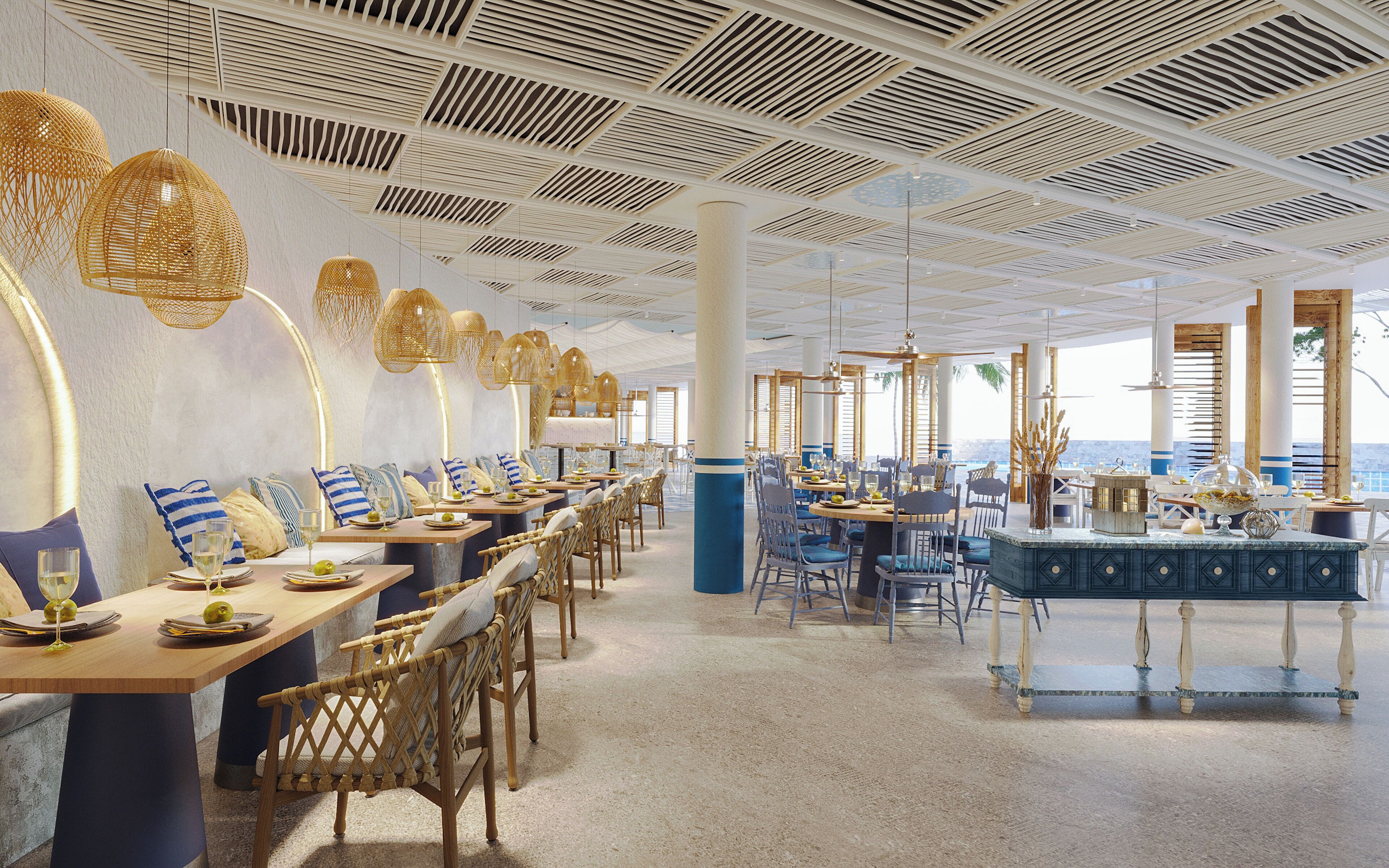 Un restaurant doté d’une grande salle à manger, de nombreuses tables, de chaises en osier et de luminaires suspendus.