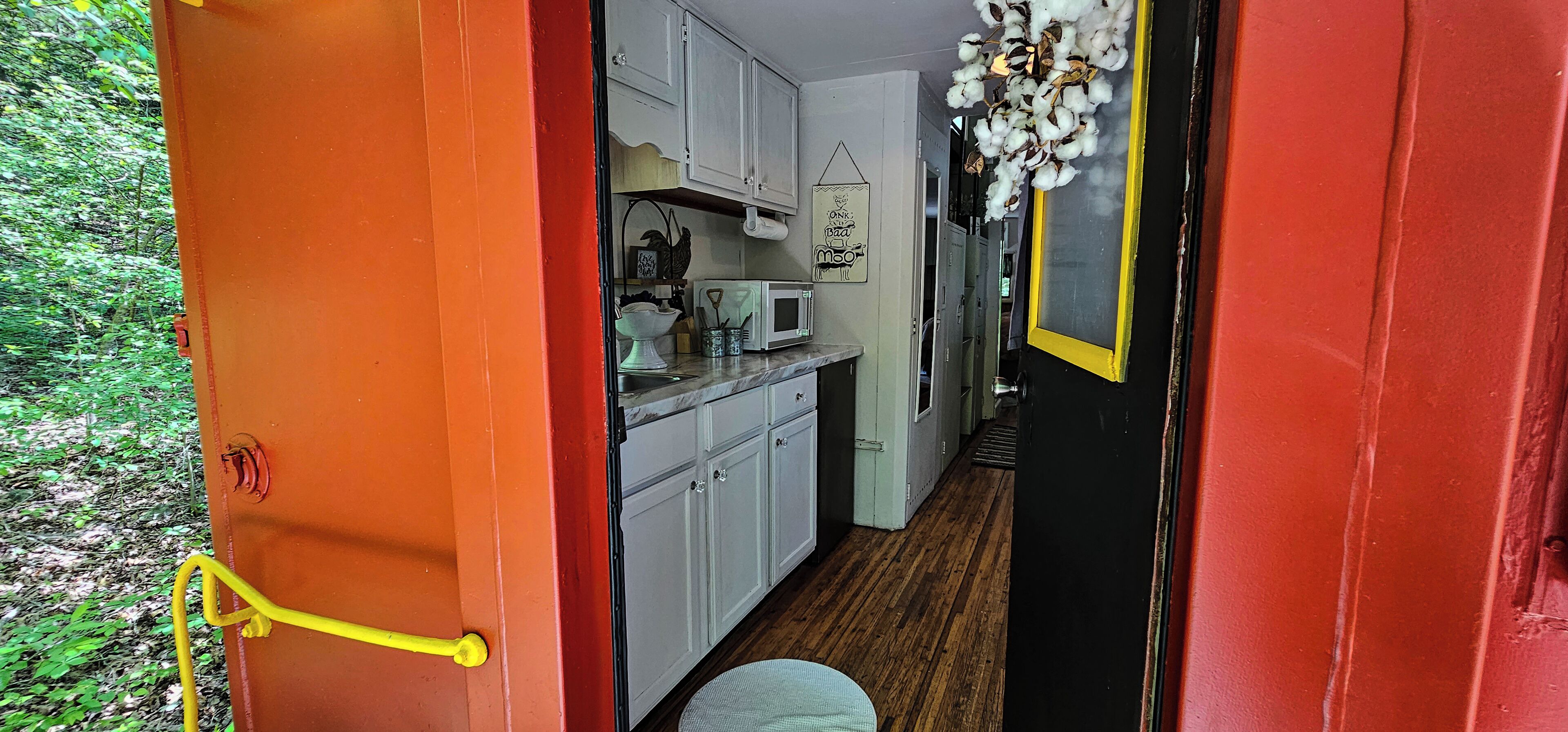 Fridge, microwave, coffee/tea maker, cookware/dishes/utensils