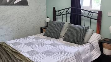 1 dormitorio, tabla de planchar con plancha, wifi gratis y ropa de cama
