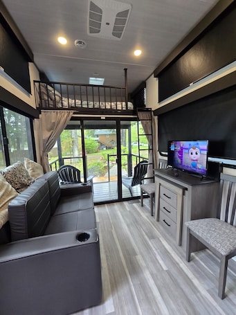 Cottage, Air conditioning, Lake View | Living area. And.N Lodging
