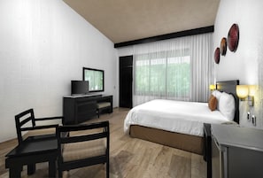 A hotel room with a bed, a desk with a television, a chair, and a bedside table with lamps. - El Cid Granada Hotel - All Inclusive (Mazatlán)