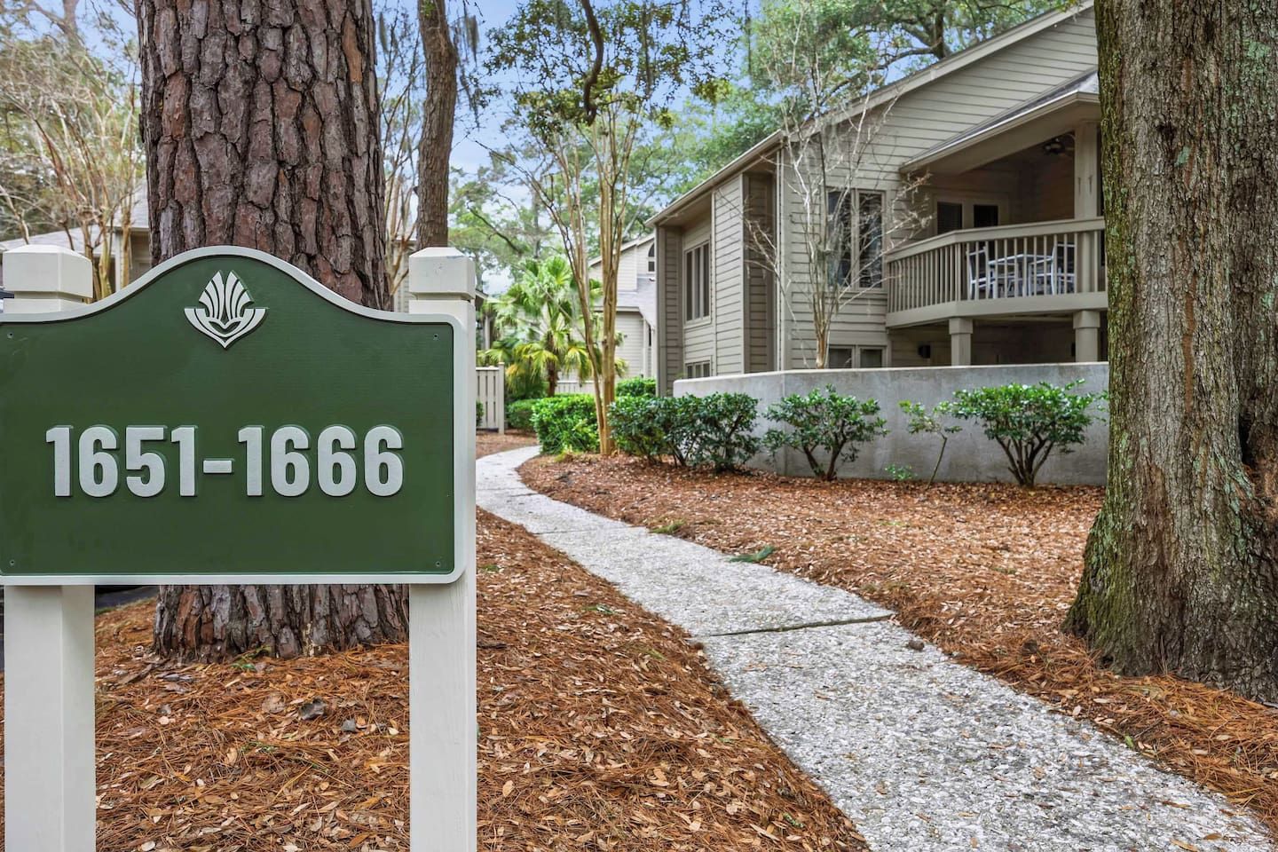 A sign with the numbers 1651-1666, indicating a property or location.