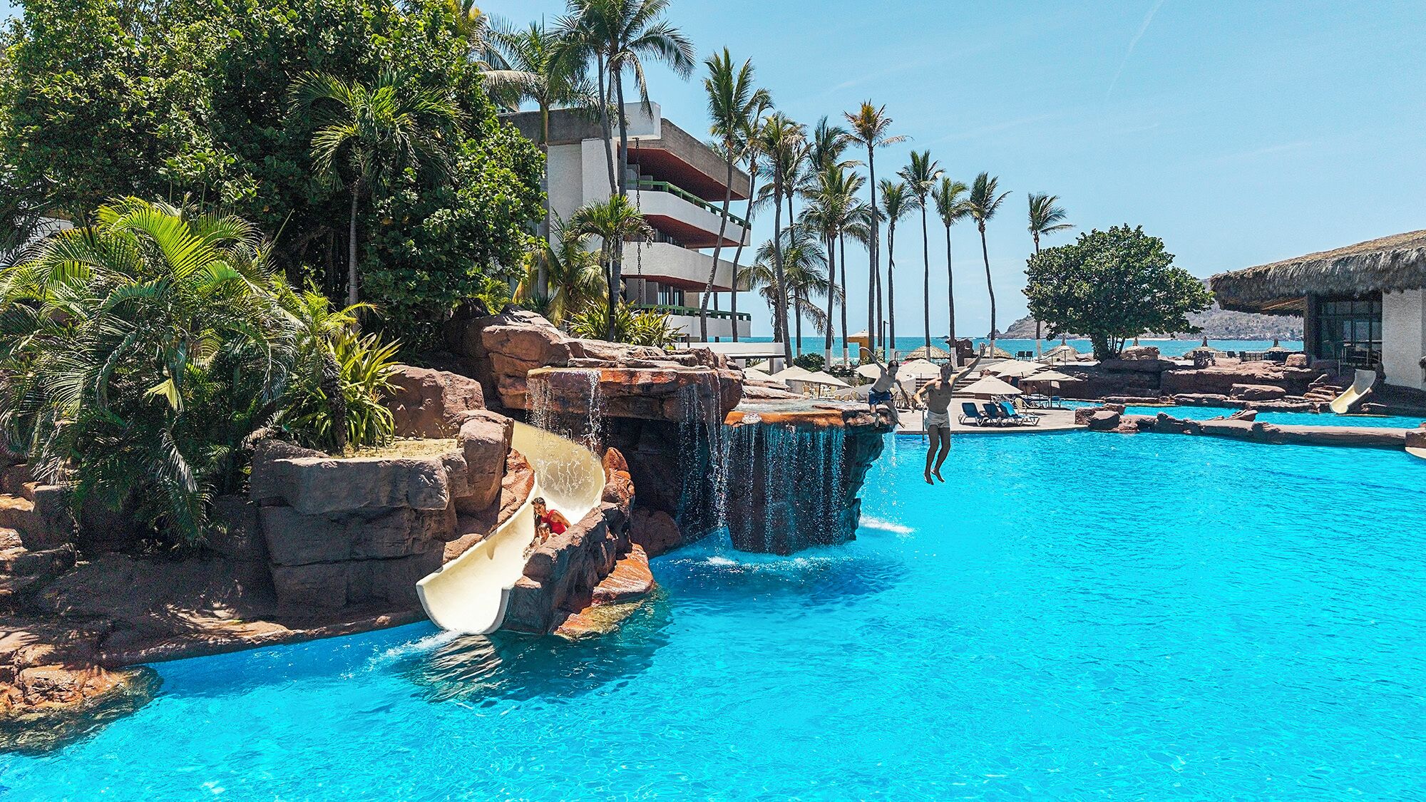 Outdoor pool, free cabanas, pool umbrellas