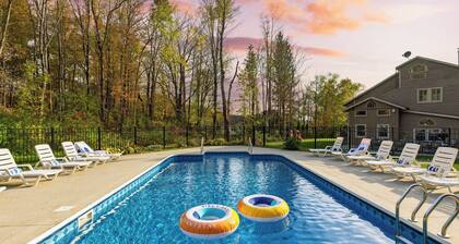 Sleeps 40 Heated Pool Hot Tub Fire Pit Game Room Brookside Mountain Retreat by Avantstay