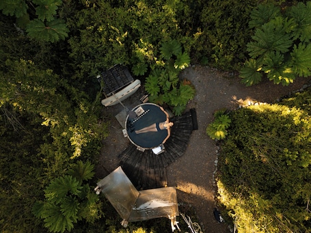 Outdoor spa tub. Carpintero: Family Cabana in the Native Forest, Ensenada