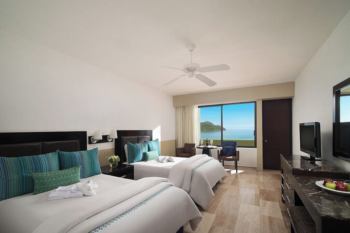 Coffres-forts dans les chambres, fer et planche Ă repasser