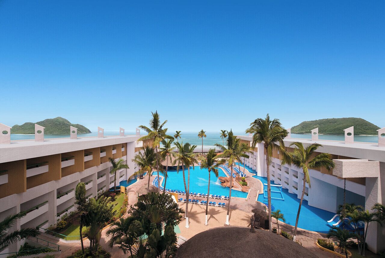 Outdoor pool, open 10:00 AM to 8:00 PM, pool umbrellas