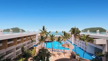 Outdoor pool, open 10:00 AM to 8:00 PM, pool umbrellas