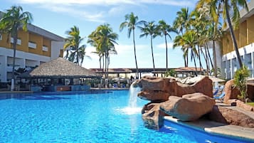 Outdoor pool, open 10:00 AM to 8:00 PM, pool umbrellas