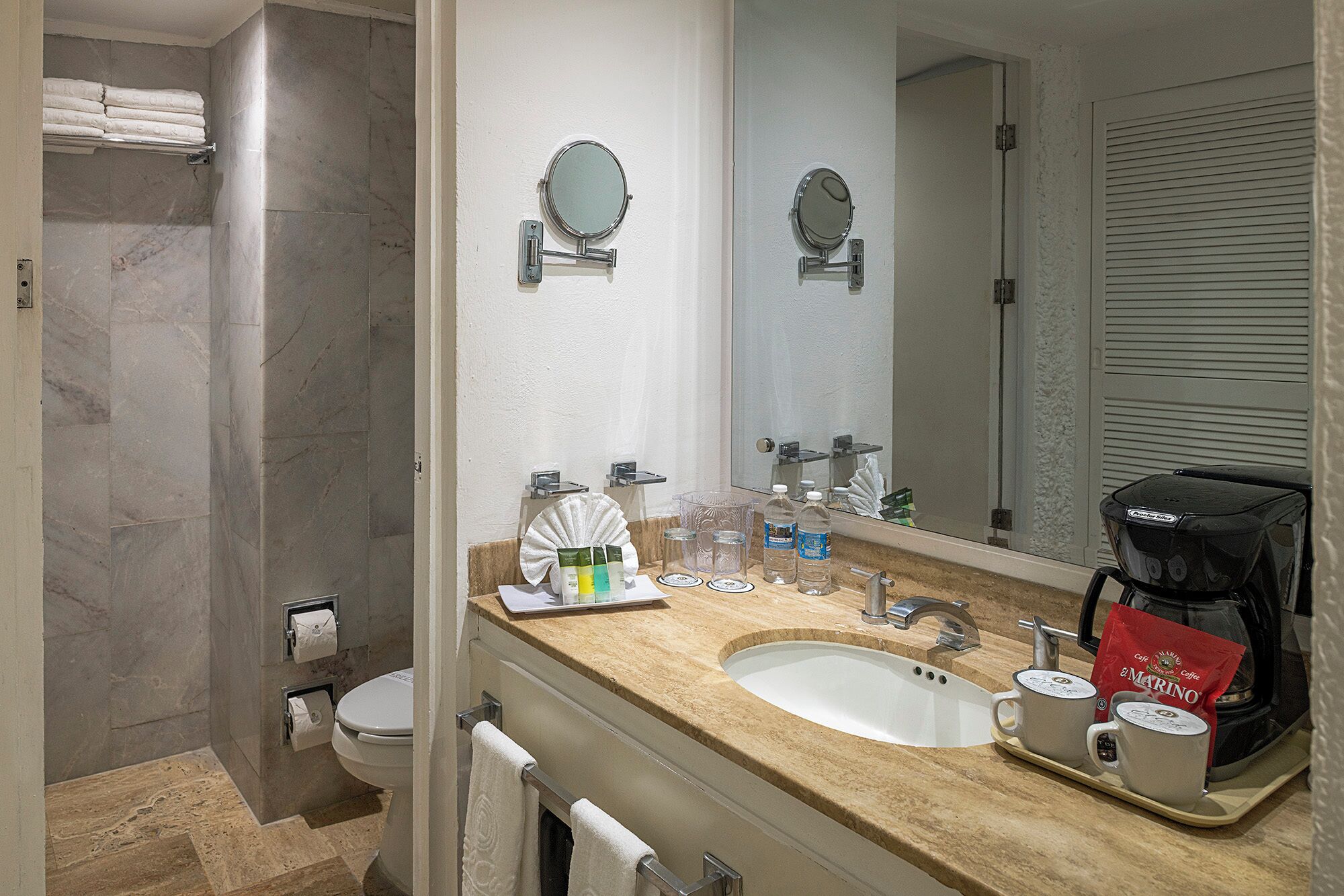 Shower, rainfall showerhead, designer toiletries, hair dryer