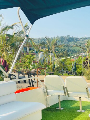 NOVABEACH Resort with a scenic view of lake kivu.