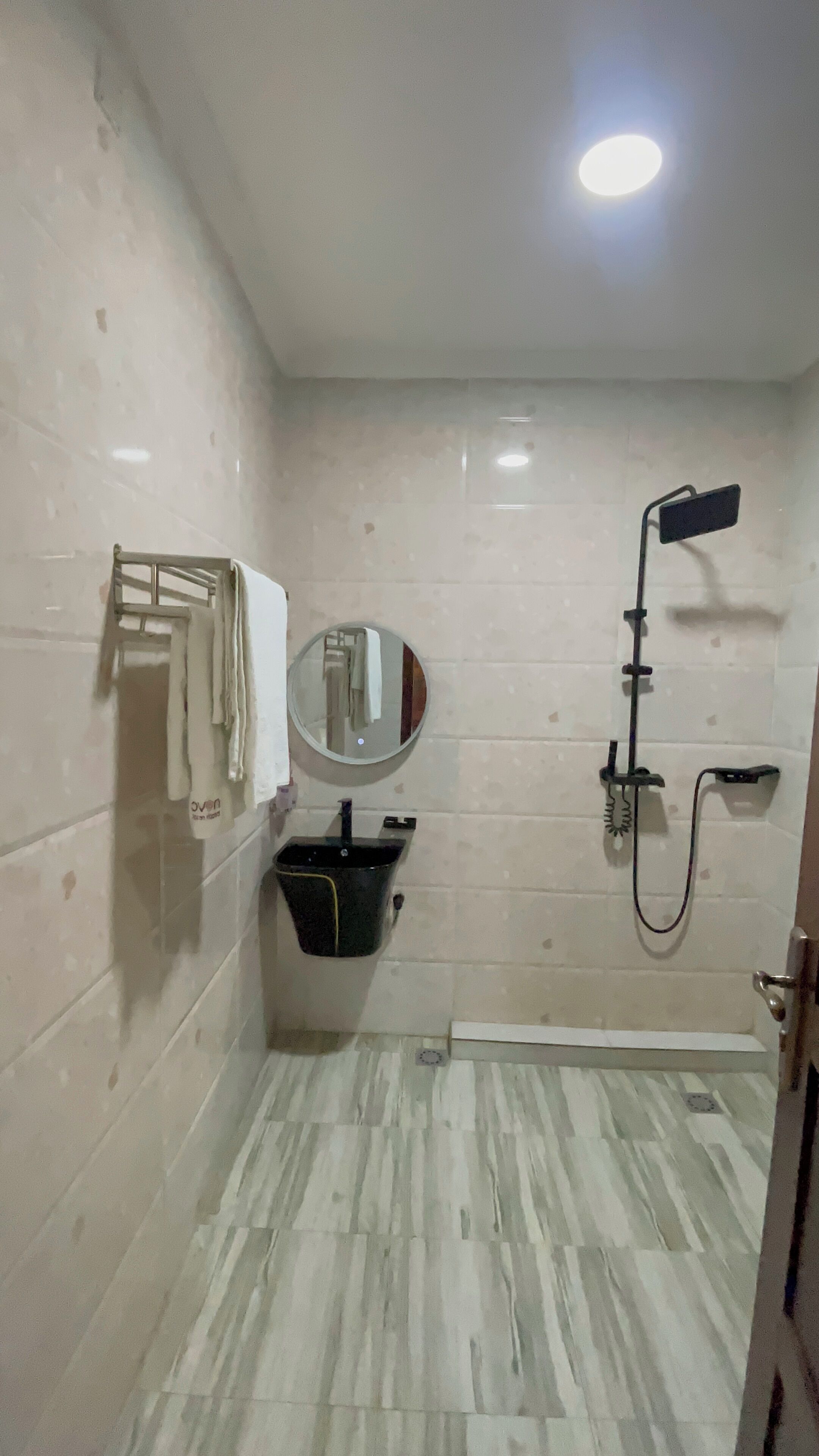 Shower, towels, soap, toilet paper