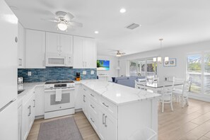 Fridge, microwave, oven, stovetop - Spacious Two-Story Townhome with Private Beach Access at Seashells of Sanibel (Sanibel)