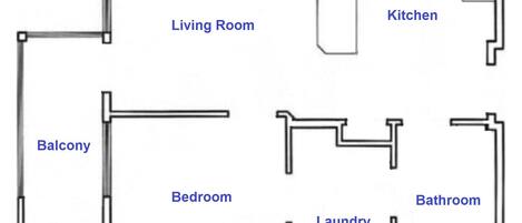 A floor plan with a living room, kitchen, balcony, bedroom, bathroom, and laundry area.
