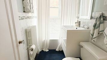 Hair dryer, towels, soap, shampoo
