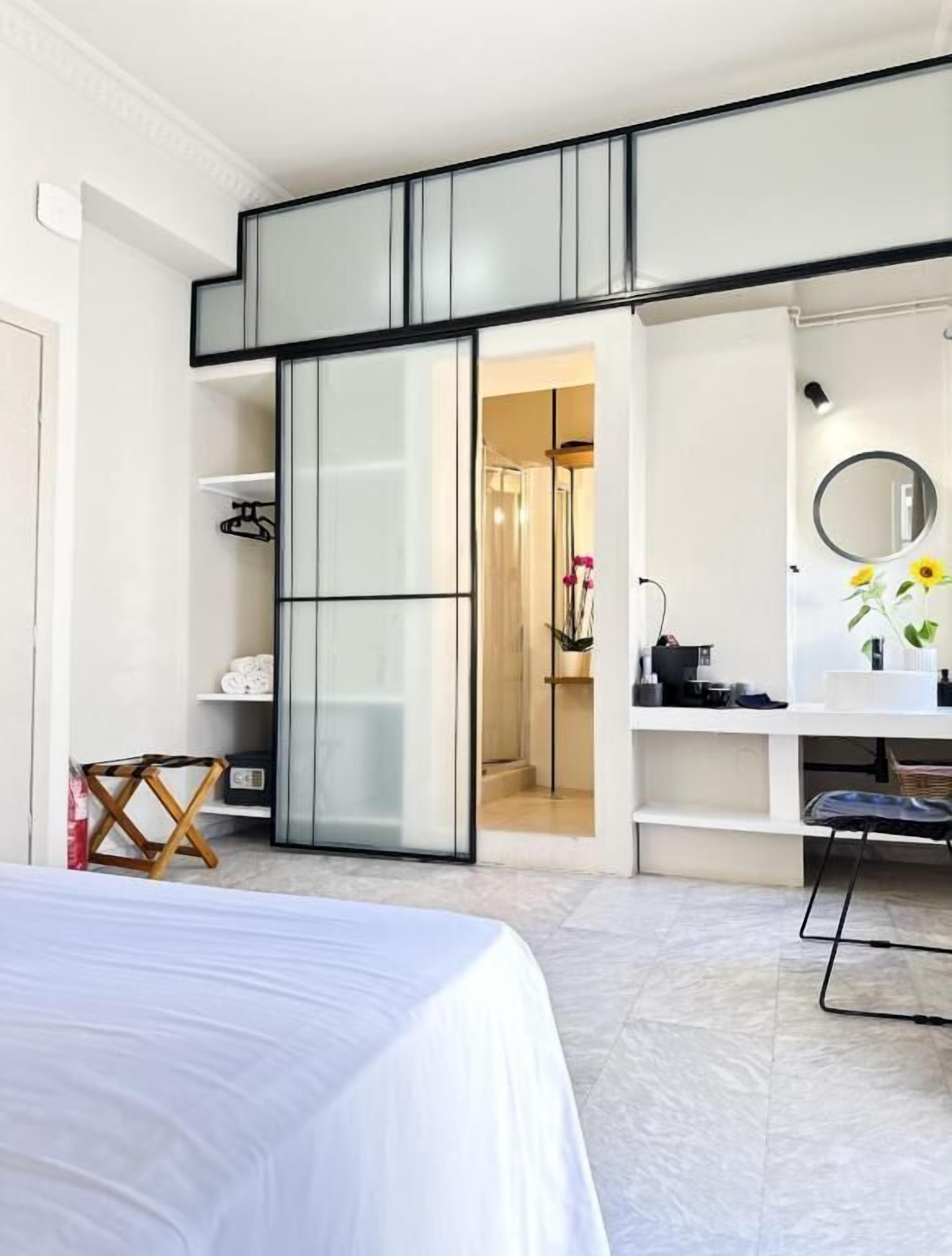 Suite Deluxe, balcón, vistas a la ciudad | Caja fuerte, tabla de planchar con plancha, wifi gratis