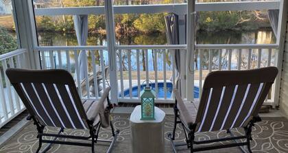 3 BR/2BA home with wading/cocktail pool on small lake. King bed. 8 mi. to beach!