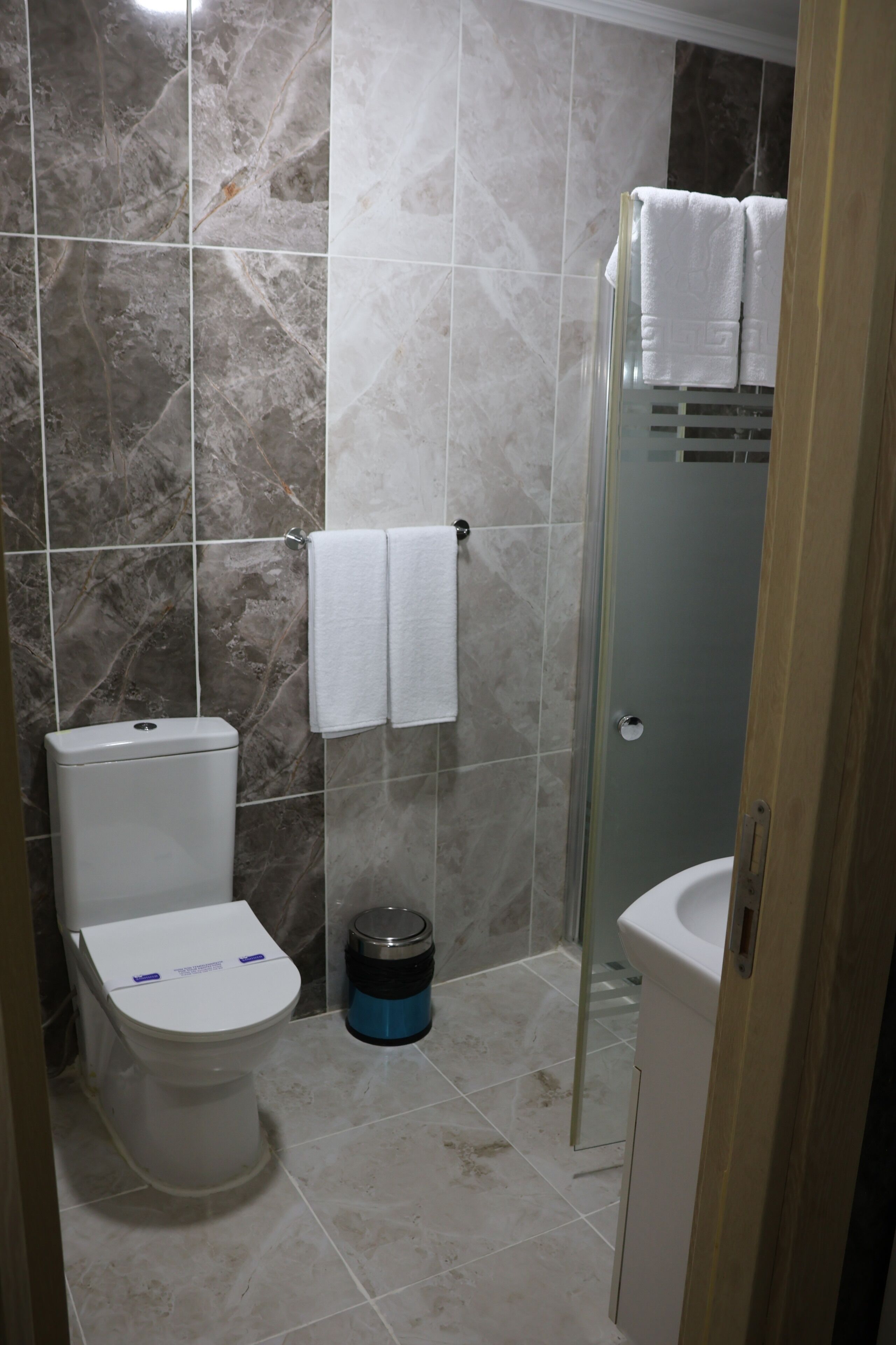 Shower, free toiletries, hair dryer, slippers