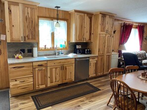 House, Multiple Beds, Fireplace, Garden View (NR #07) | Interior - Nitschke's Resort Cabin #7 - Pet Friendly (Minocqua)