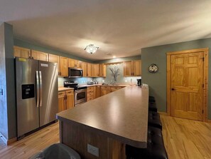 Townhome, Multiple Beds, Patio (Minocqua Lk Condo B7) | Private kitchen - Minocqua Lake Condo B7- 2 Story Rustic Town Home (Minocqua)