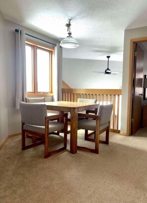 Condo, Multiple Beds, Fireplace, Garden View (Pointe Unit 203) | Dining - The Pointe Resort & Club 2 Bedroom Condo (Minocqua)
