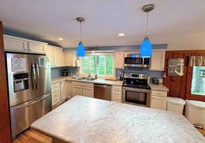 House, Multiple Beds, Patio (Blue Lake Cottage) | Private kitchen - Blue Lake Cottage - Pet Friendly Rental (Minocqua)