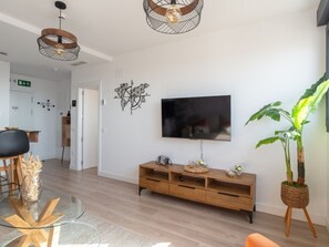 TV - Modern apartment on the 26th floor with common areas in Málaga (Málaga)