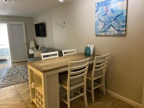 Dining - 1-bedroom condo on Navarre Beach with private beach access, pier, and pavilion. (Navarre)
