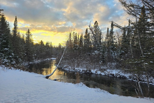 Sunset views along the Thunder Bay River, just steps from the cabin