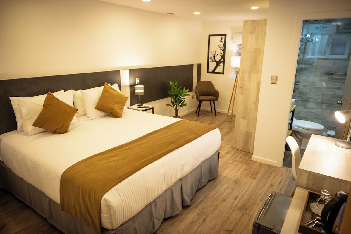 Comfort Double Room, City View | In-room safe, desk, laptop workspace, iron/ironing board