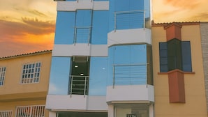 A hotel with a modern design, featuring a prominent 'HOTEL' sign on the facade. - Hotel Blue Santa Rosa de Cabal (Santa Rosa de Cabal)