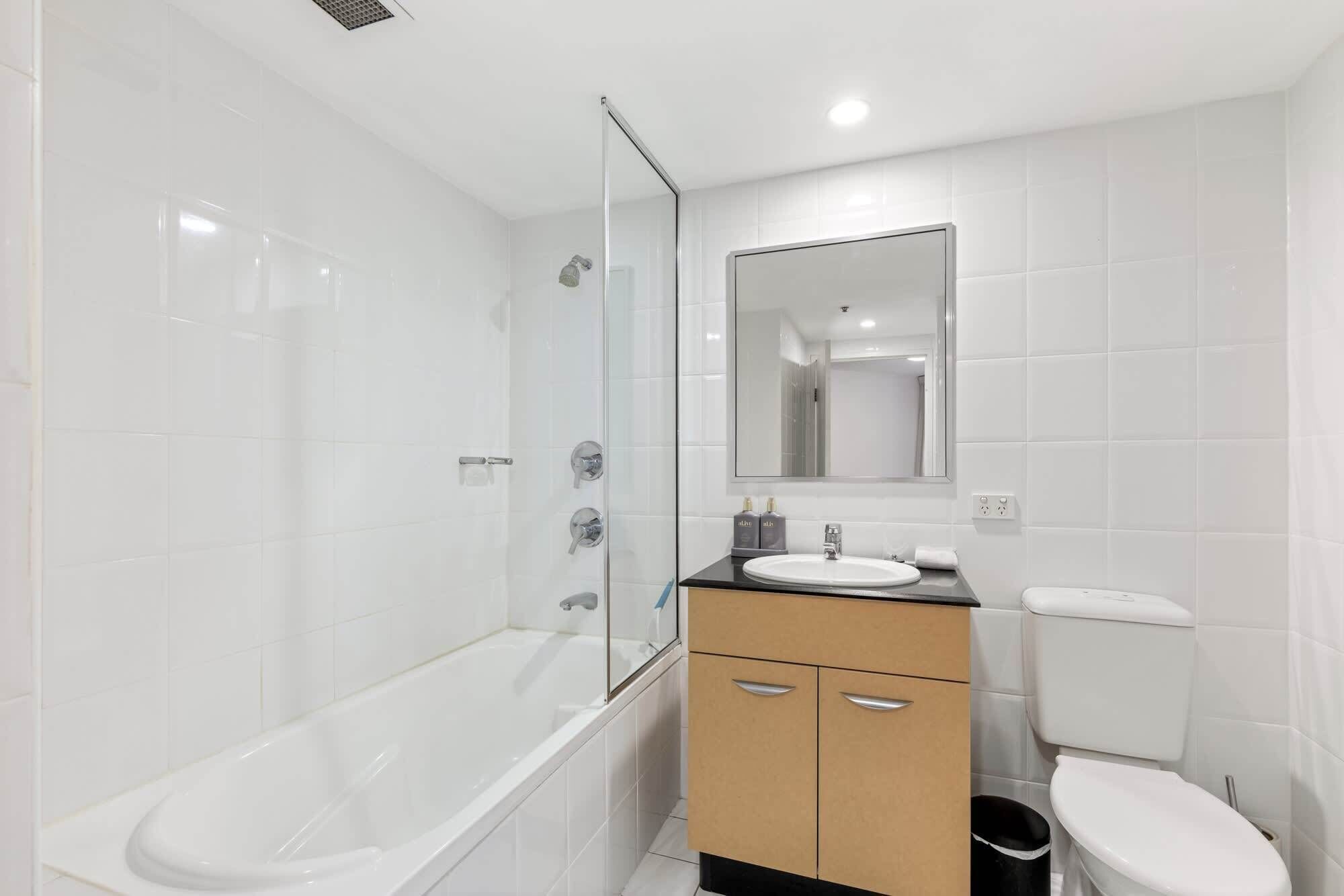 Shower, hair dryer, towels